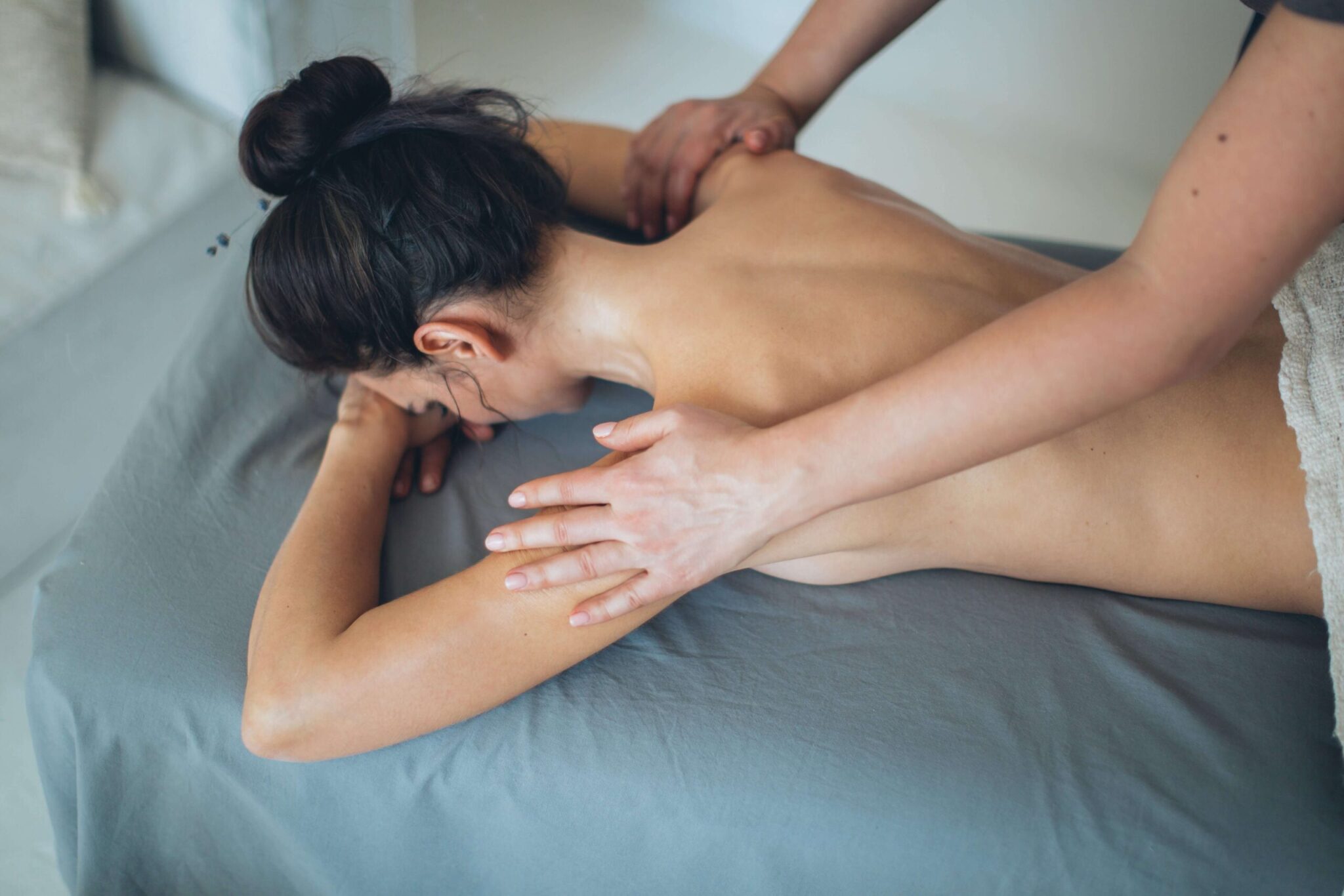 An image of a women having Tantric Touch massage.